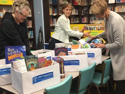 members sorting books